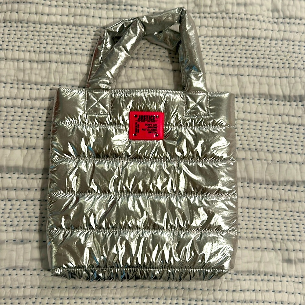 JUSTICE Silver quilted shoulder bag.